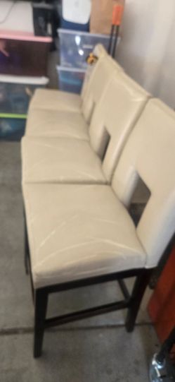 4 counter height chairs