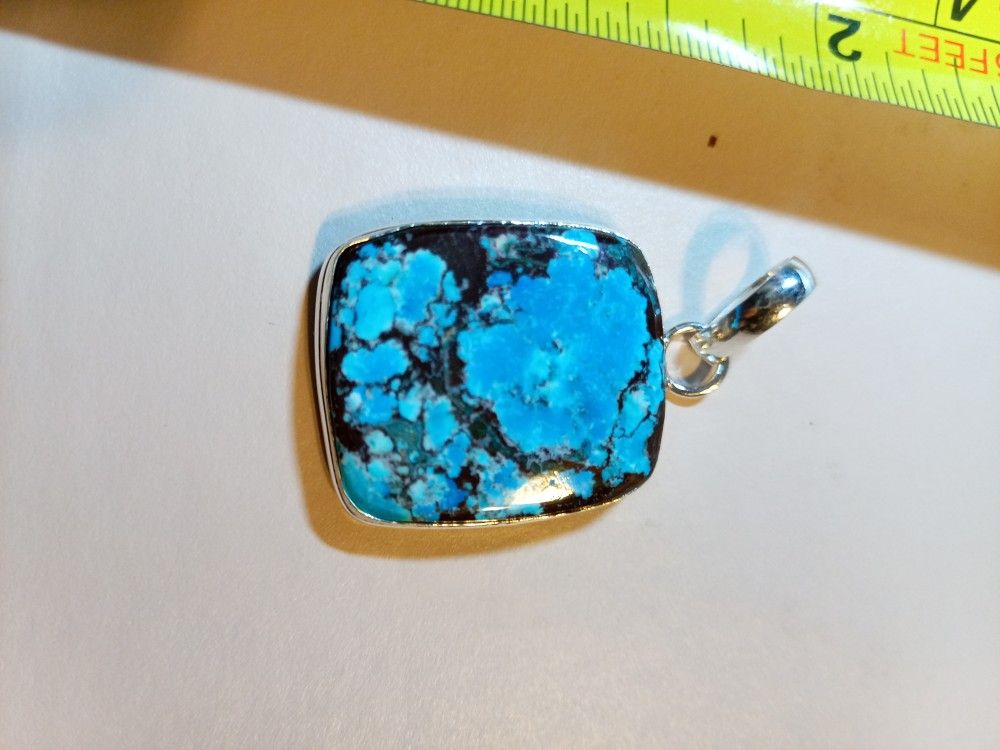 Turquoise On Silver Pendant 