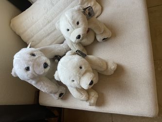 Three Coca-Cola stuffed bears