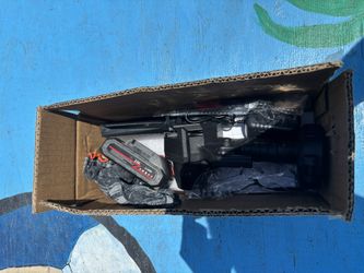 Mini Red Chainsaw