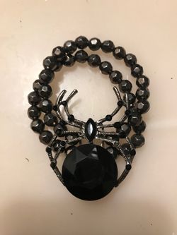 Very nice black widow black ruby bracelet only $10