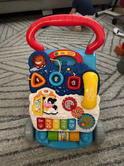 Two V-tech Learning Walkers