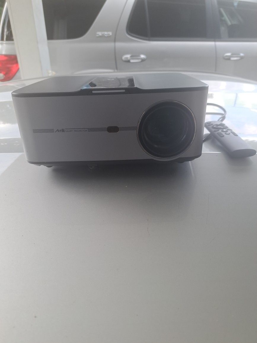 Smart Wifi Projector With Remote Like New Paid 300 For Will Sale For 80.