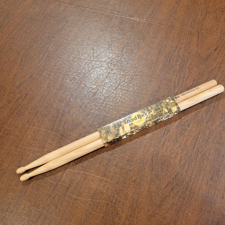 HARD ROCK CAFE HRC Natural Wood Drum Sticks 16" Washington D.C. New,
with tag. UPC 00(contact info removed)133. Weight 5oz plus shipping materials.