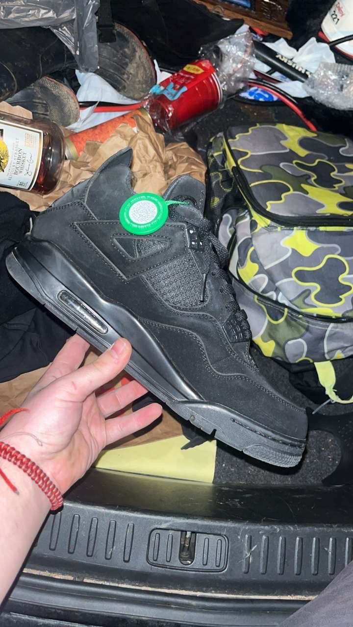 Black Cat Jordan 4s