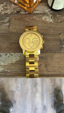 Golden Movado watch