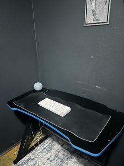 gaming desk and 2 monitors