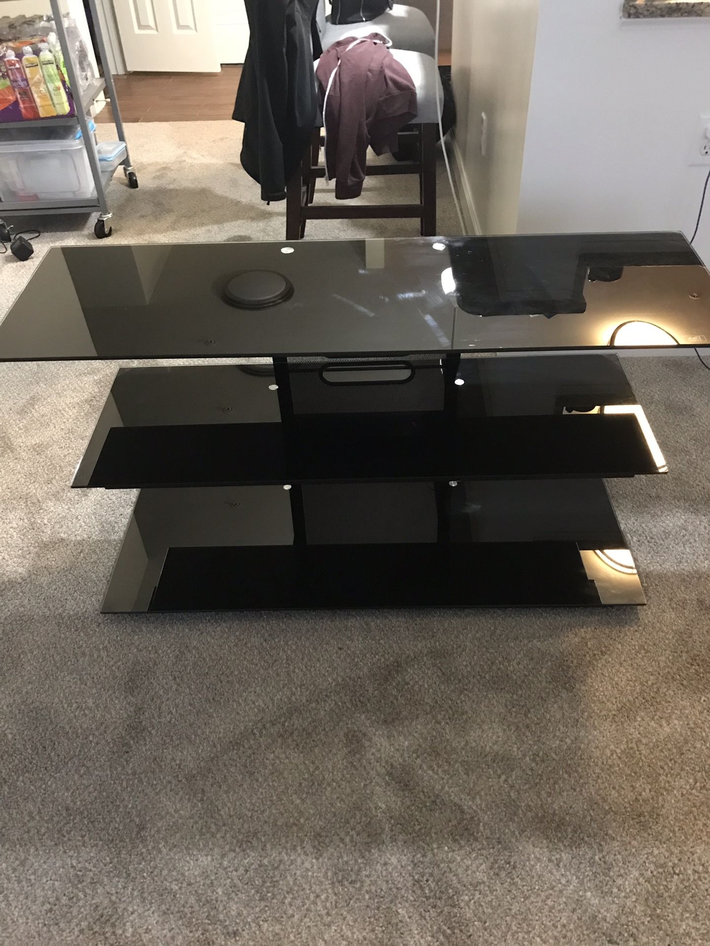 Black glass and metal TV stand