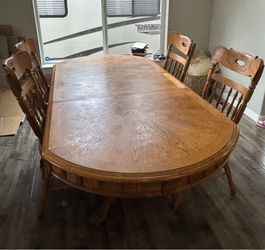 Oak dining table and chairs
