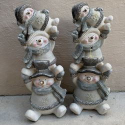 Set of two Festive Snowman Figurines with Gray and white Accents stacked in a playful design. Perfect for Christmas holiday decorations. Size: 71cm H 