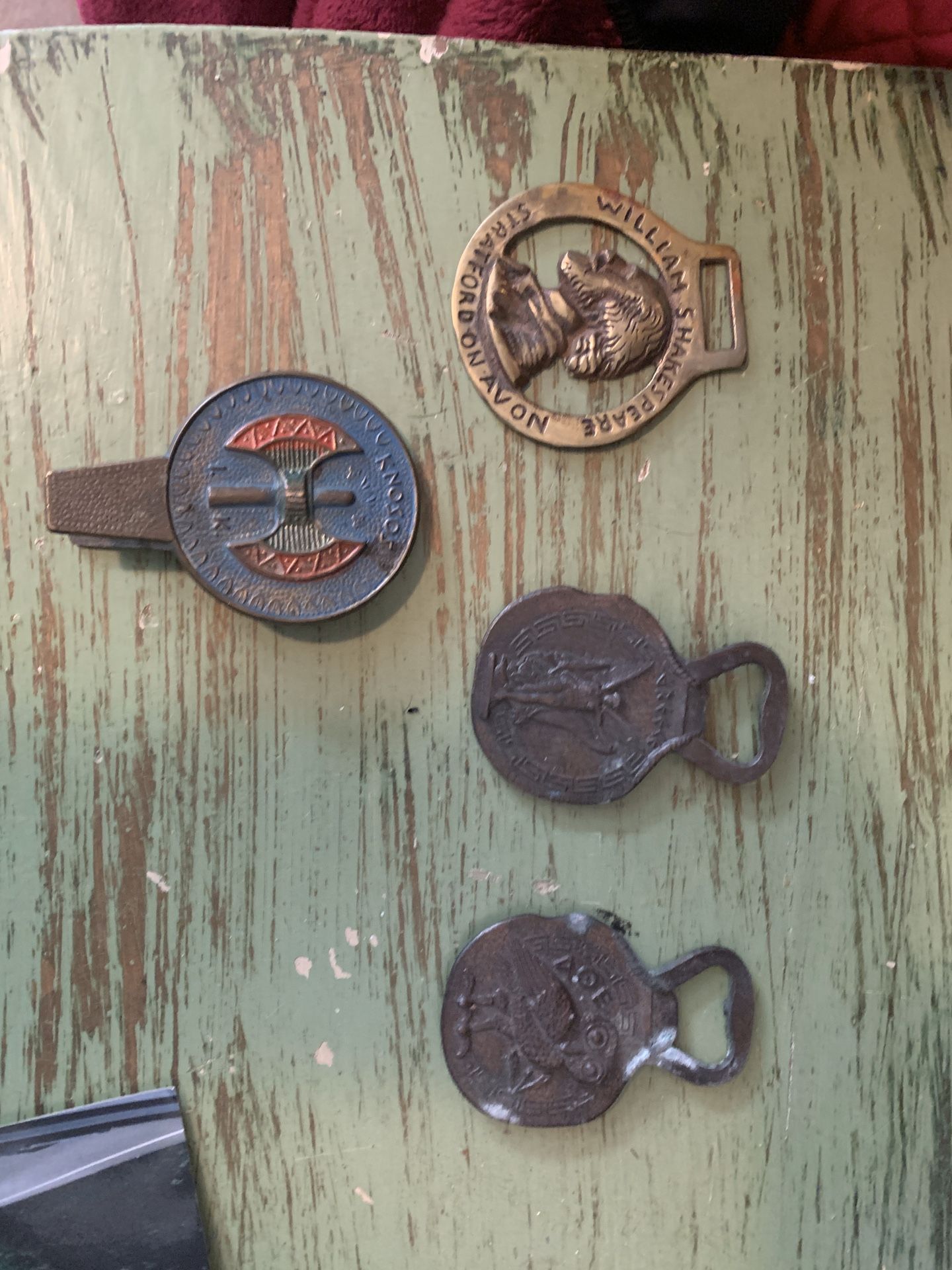 Antique bottle openers and clip