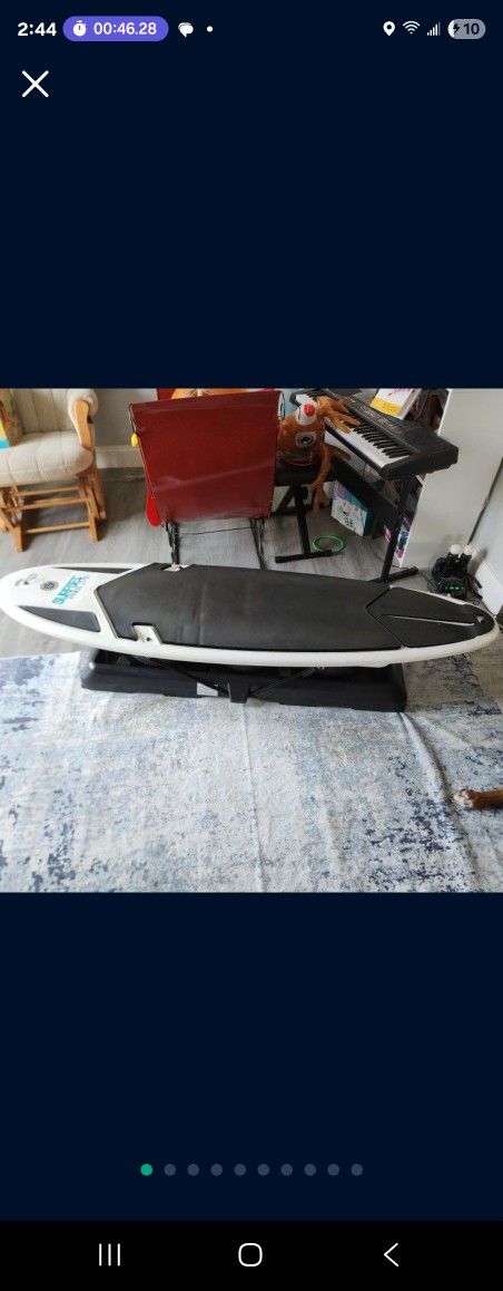 Surfset Fitness Board & Stand in great shape great for working out & for surfers to practice on no wave days, it acts like a real Surfboard, Its FUN!!
