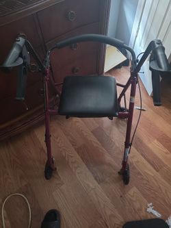 Walker/chair with cubby
