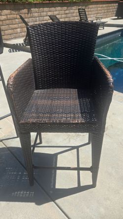 MAKE OFFER - 2 chairs, counter/bar height. Brown. Outdoors. MUST SELL