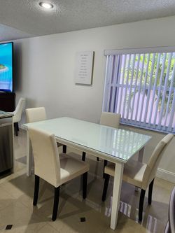 Table with 4 Chairs and Glass Top