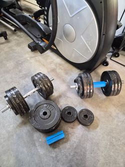 Adjustable dumbells 5-100 LBS
