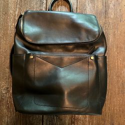 Clark’s black leather backpack