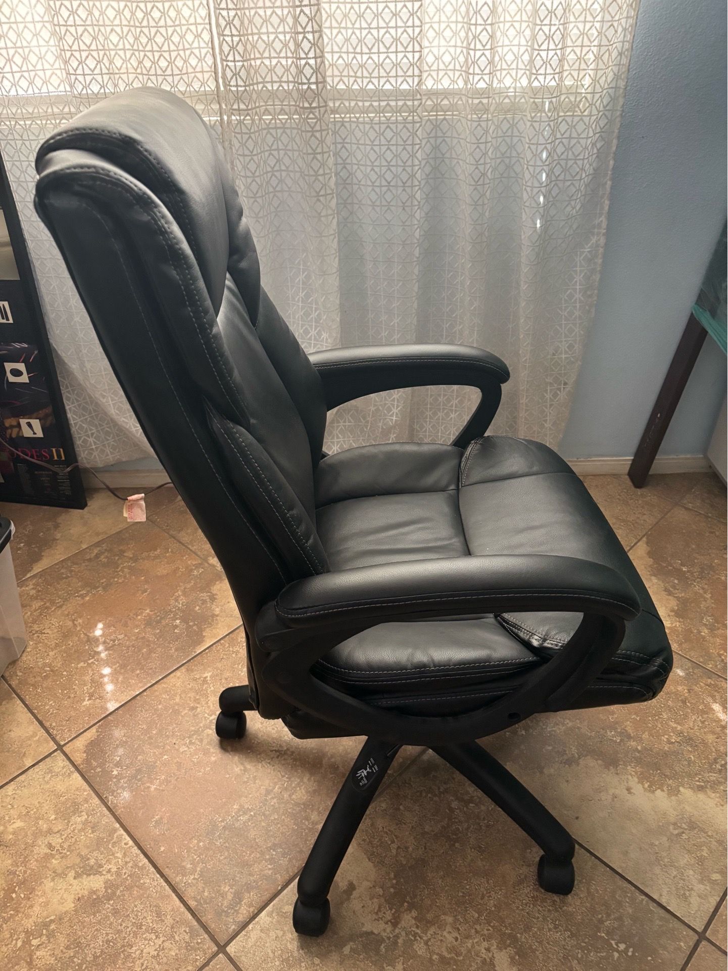 Nice black office chair with wheels, comfortable