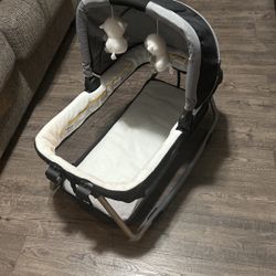 Brand New Never Used Rocking Bassinet