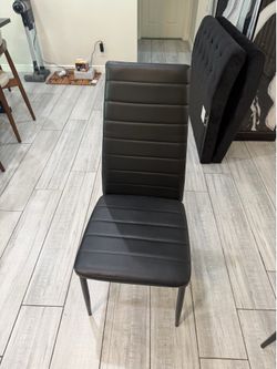 4 black chairs