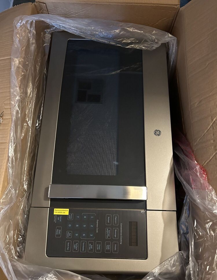 GE Over The Range Microwave BRAND NEW NEVER USED