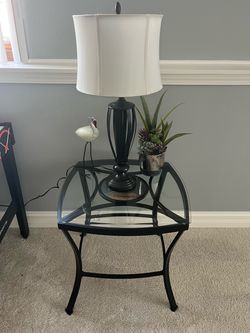 Small tables and lamps for sale.