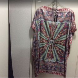 Elegant top for special occasion or any way you like brand new was $230 medium size.