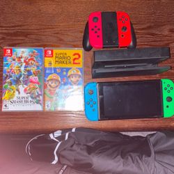 Nintendo Switch With Controllers And 2 Games
