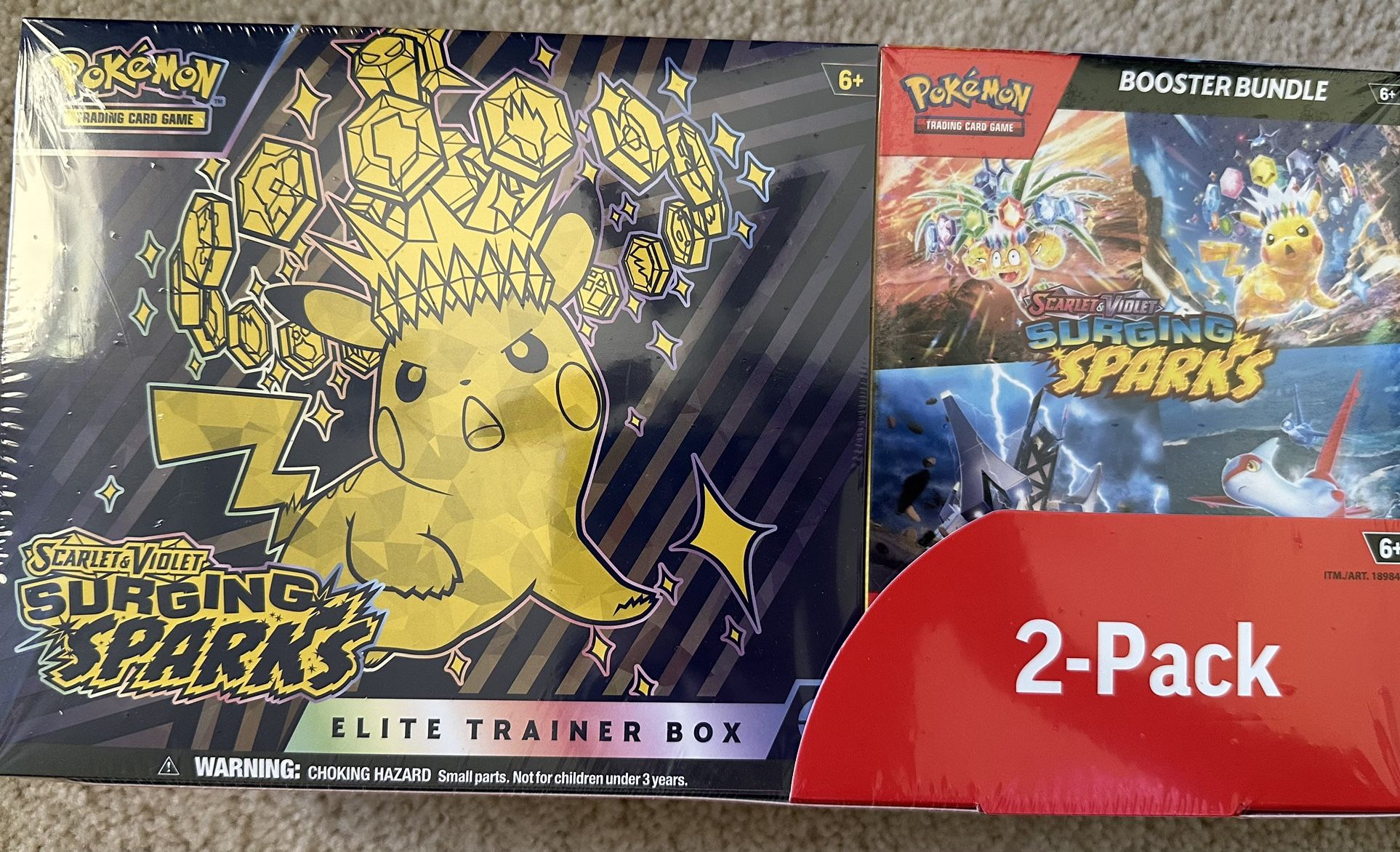 Pokémon surging sparks trading cards. Sealed.
