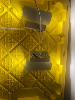 IKEA NYMÅNE wall up/downlight in white—the cylindrical fixture that shines light from both ends.