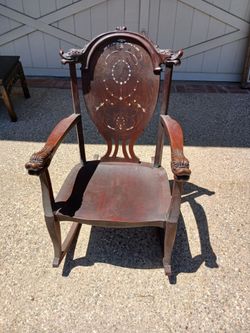carved mahogany rocking chair