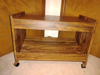 Tv Stand on Casters w/ Shelf! 28 1/2" wide x 21 1/2" tall x 16" in depth.