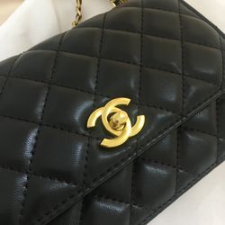 black chanel purse gold chain