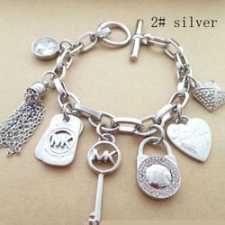 MK bracelet with hanging charms