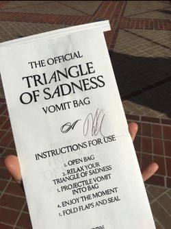 Autographed triangle of sadness movie merch palme d'or vomit bag