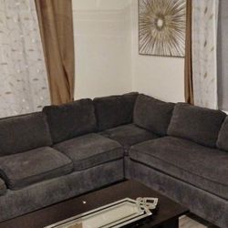 three pieces two sofas and one ottoman 