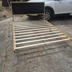 Queen bed blue and gold headboard and footboard