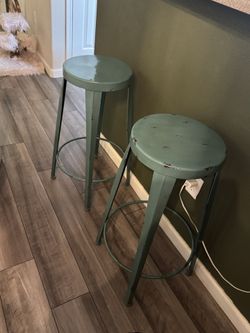 2 turquoise bar stools