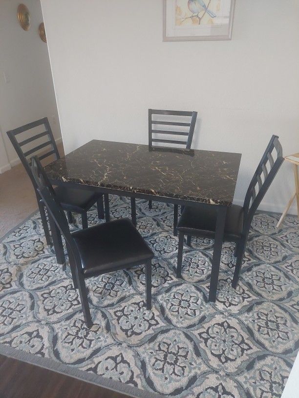 Table and with 4 chairs