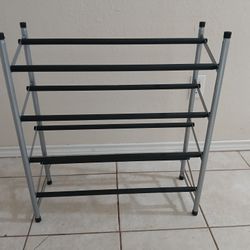 New shoe rack.  Expands to over 3 and 1/5 feet.  $10