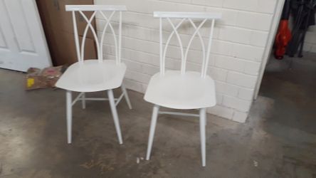 New set of 2 metal dining chairs $50 firm