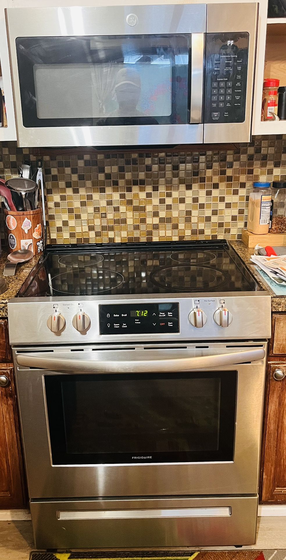 Frigidaire Electric Range Oven And GE Microwave