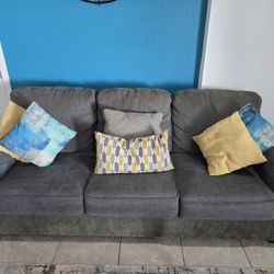 Living room set: 3 seat sleeper sofa, love seat, oversize chair (broken arm) and coffee table