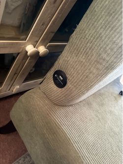 Small green couch with usb