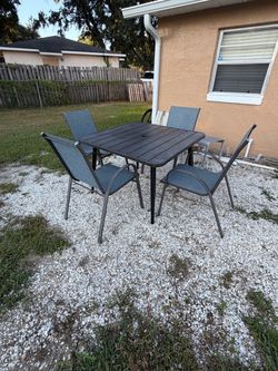 Patio table and four chairs