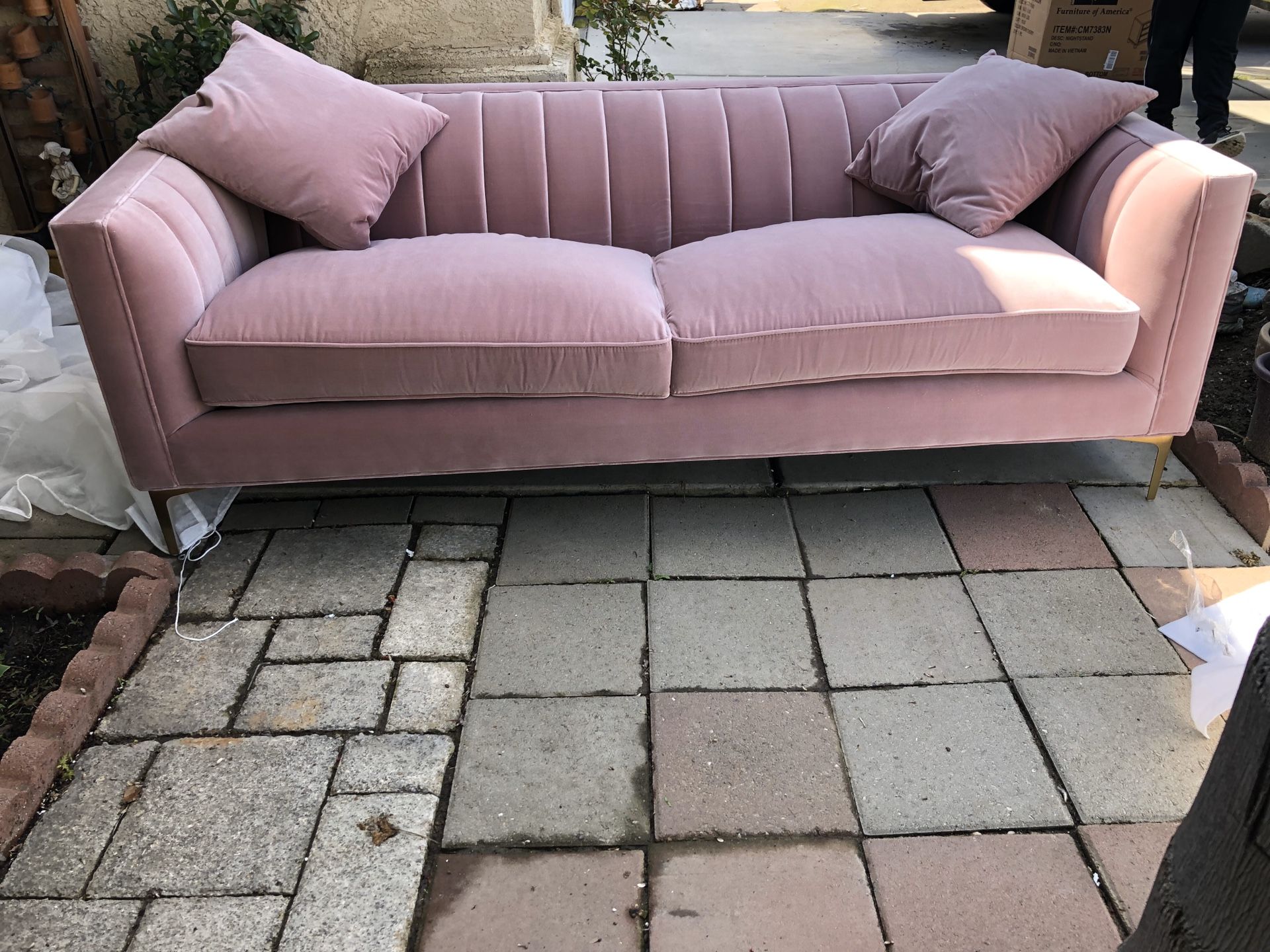 Brand new pink velvet sofa. Retails for over $1800