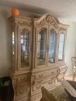 Kitchen table  8 chairs and china cabinet need gone bye Sunday afternoon
