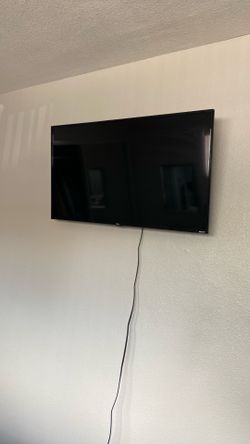 Roku TV with wall mount