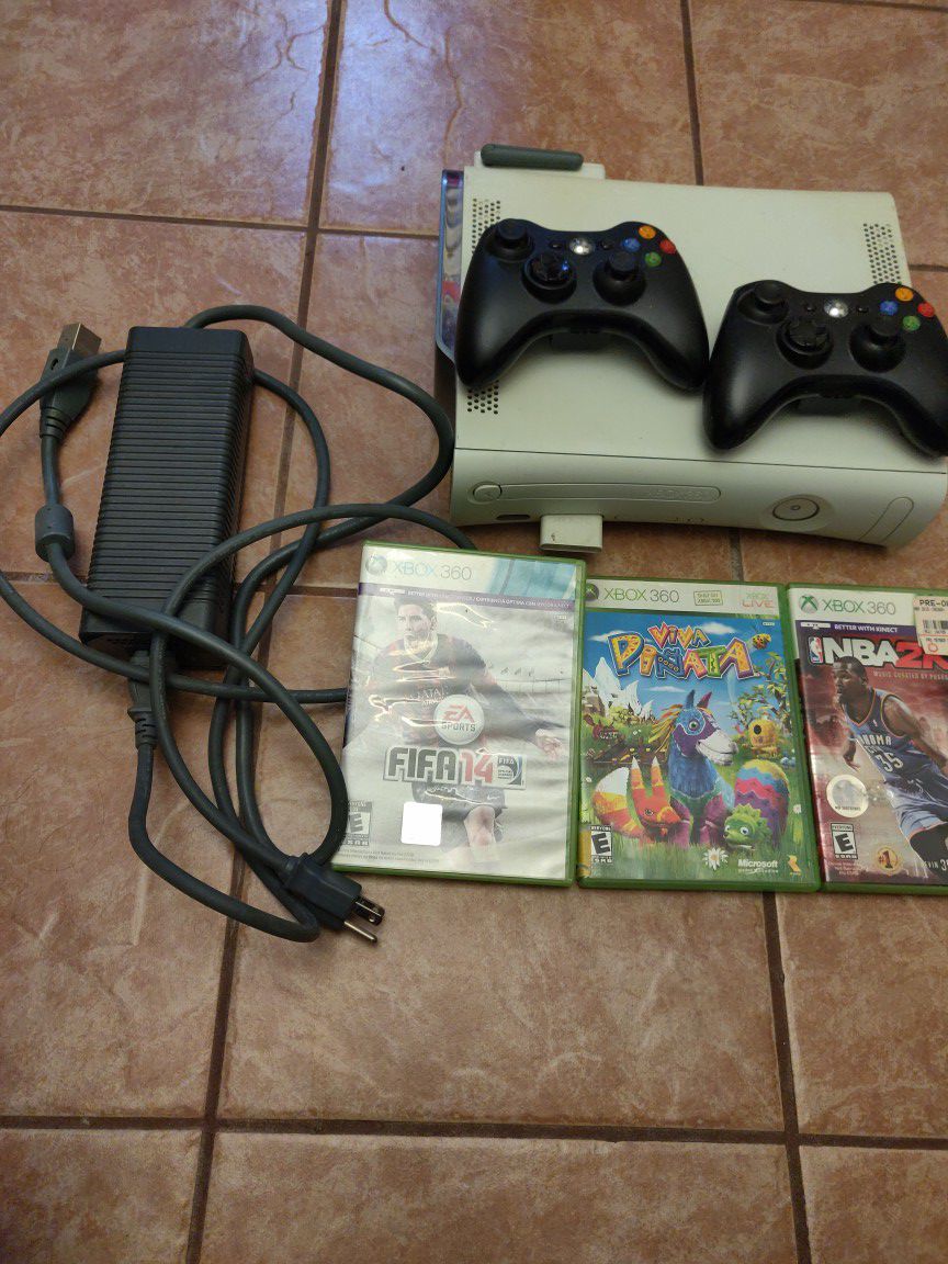 Xbox 360 with 2 controllers and all games included
