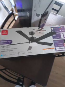 Brand new ceiling fan in the boxs 52 inch blades are reversible l.E.D lights can change 12 different colors has a remote as well as wifi connection